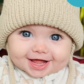 Smiling baby won baby photo contest